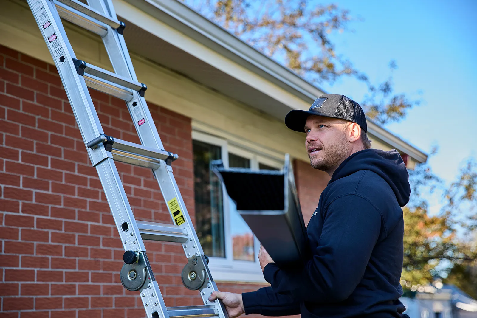 Team installation at the roofline — Gutter Doctor, Salisbury, Kannapolis & Lexington, NC