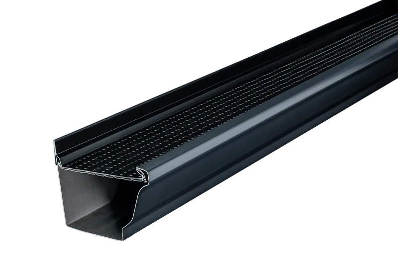 Installer positioning an Alu-Rex continuous hanger gutter guard